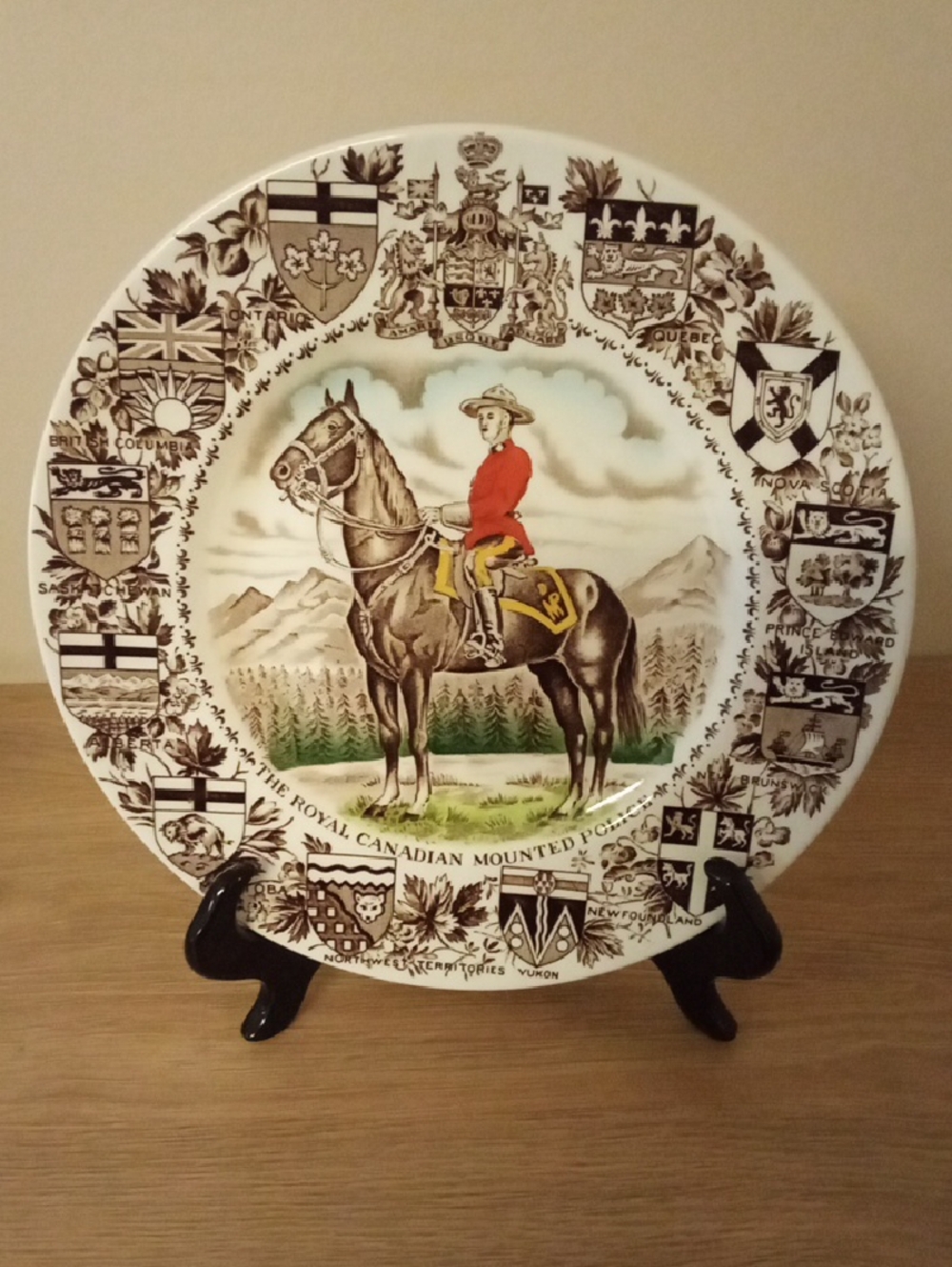 Vintage Royal Canadian Mounted Police Plate with Red Tunic and Brown Horse